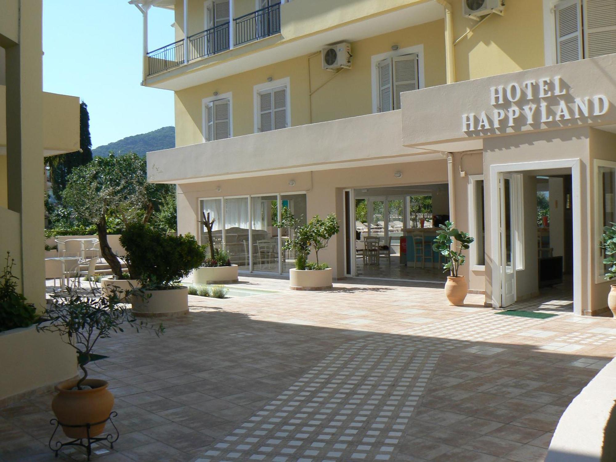 Happyland Hotel Apartments Нидри Экстерьер фото