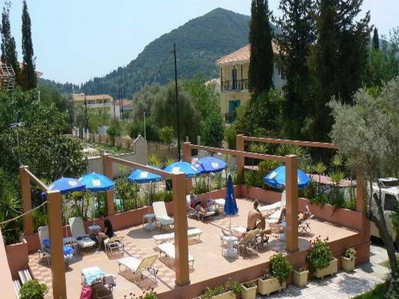 Happyland Hotel Apartments Нидри Экстерьер фото