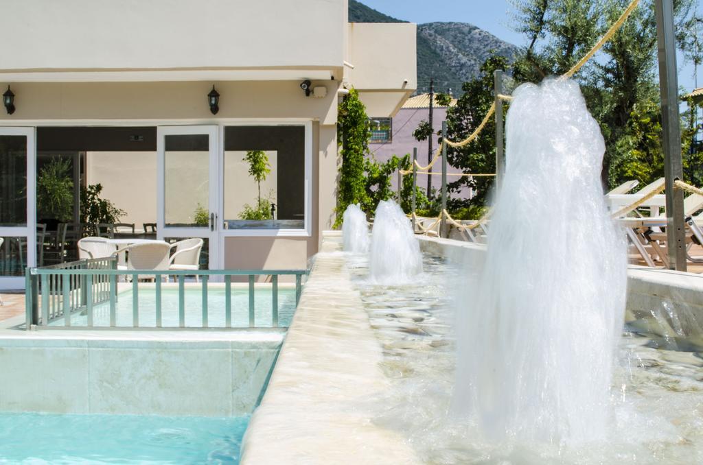 Happyland Hotel Apartments Нидри Экстерьер фото
