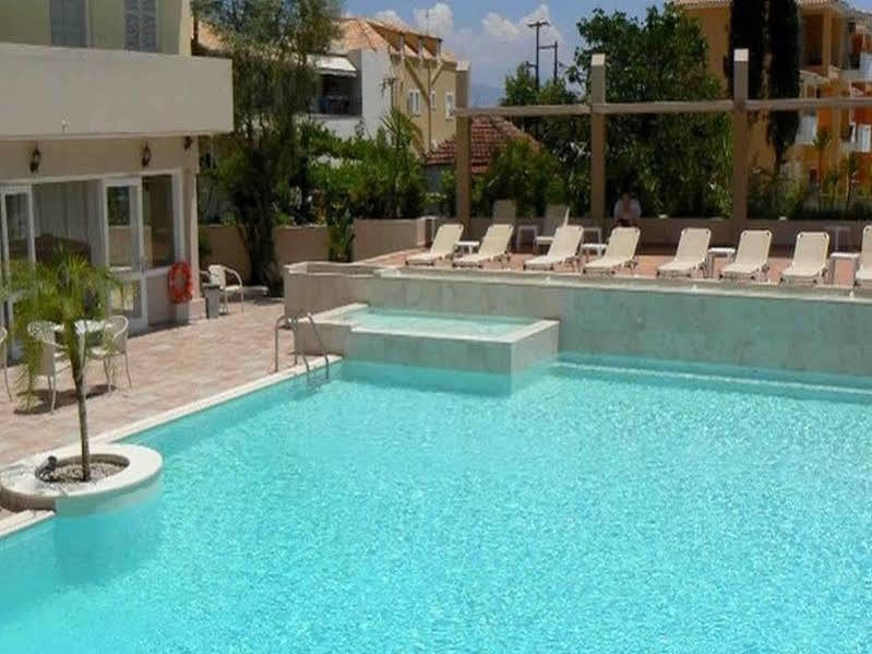 Happyland Hotel Apartments Нидри Экстерьер фото