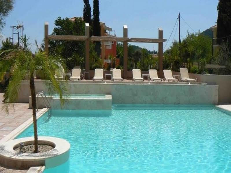 Happyland Hotel Apartments Нидри Экстерьер фото