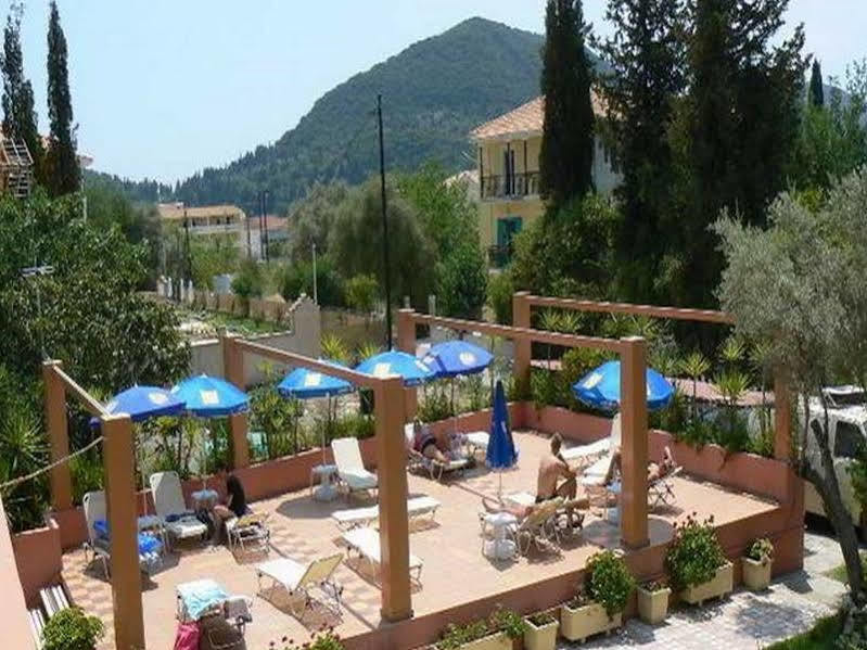 Happyland Hotel Apartments Нидри Экстерьер фото
